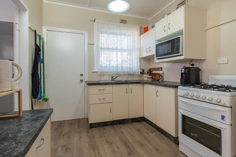Kitchen or kitchenette, oven, stove