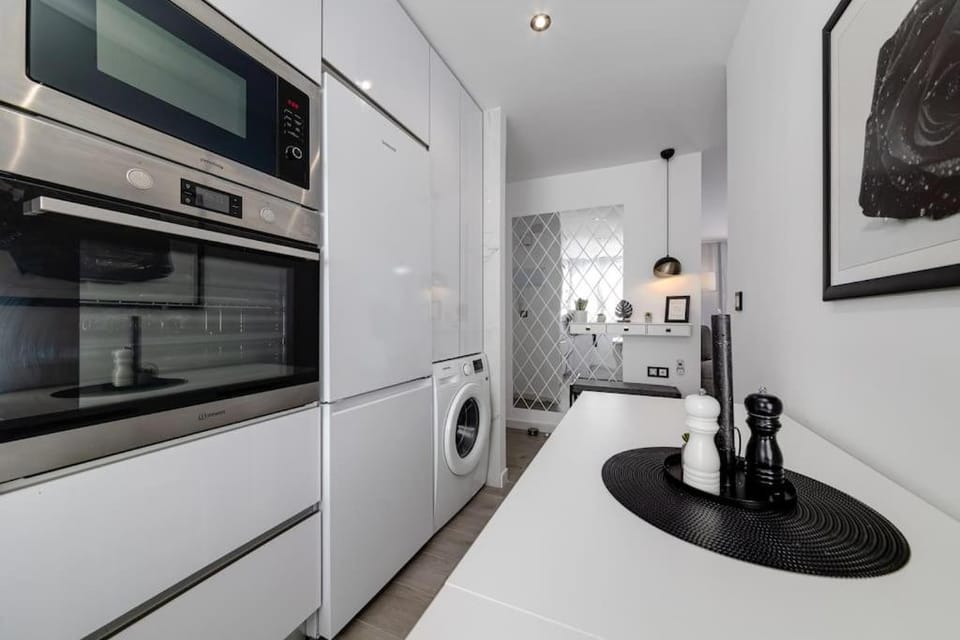 Kitchen or kitchenette, washing machine