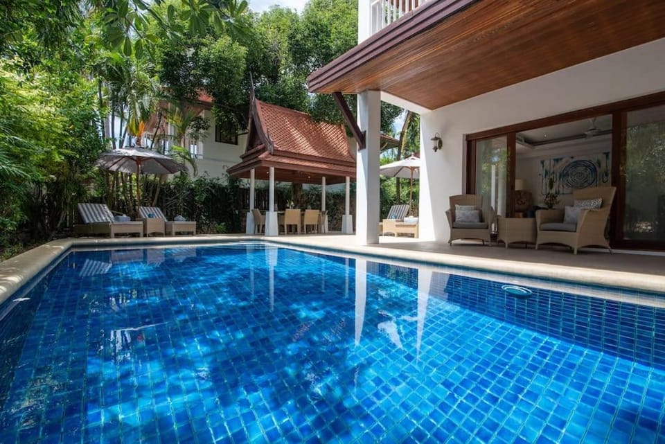 Property building, Patio, Pool view, Swimming pool, sunbed