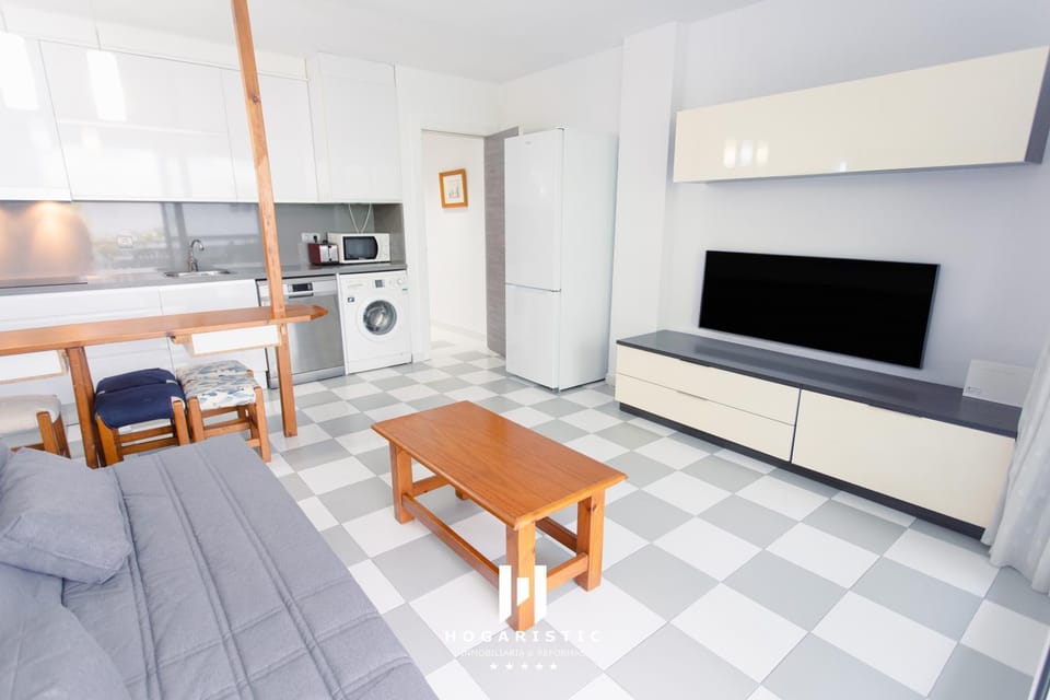 Kitchen or kitchenette, stove, washing machine