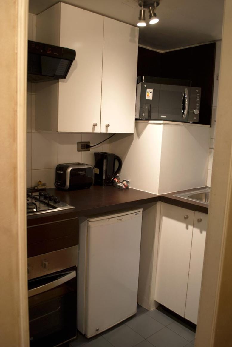 Kitchen or kitchenette, oven, stove, toaster