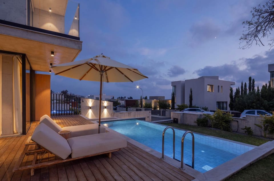 Property building, Night, Pool view, Swimming pool, sunbed