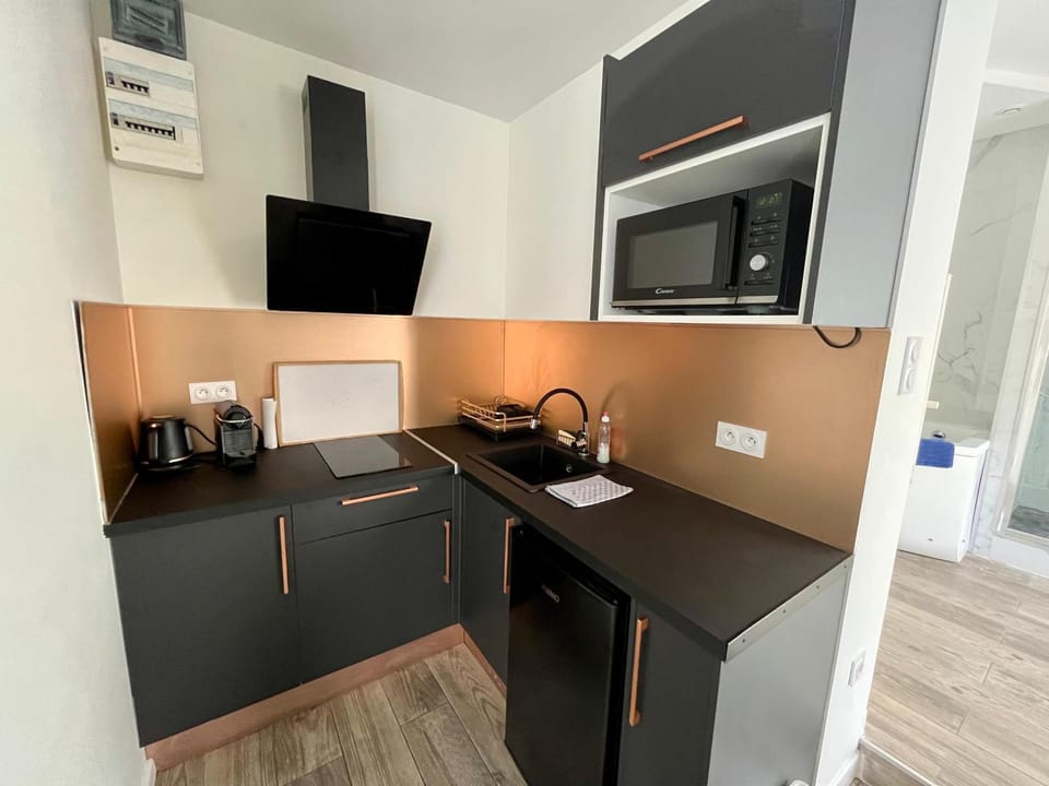 Kitchen or kitchenette, stove