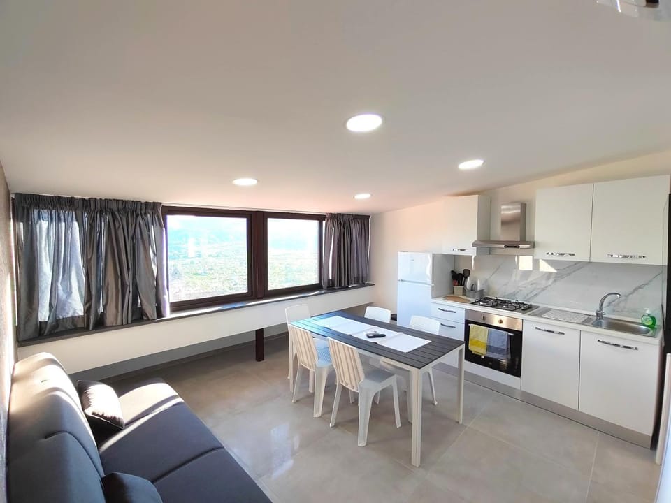 Kitchen or kitchenette, Living room, Seating area, Dining area, oven, stove, kitchen