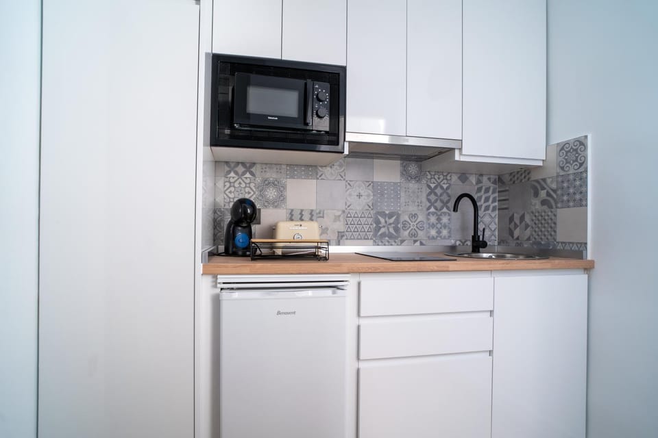 Kitchen or kitchenette, stove, toaster