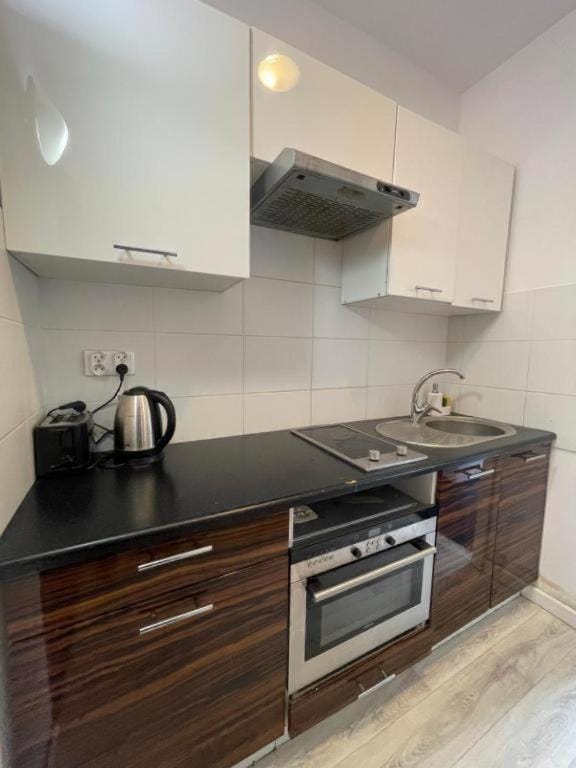 Kitchen or kitchenette, stove, toaster