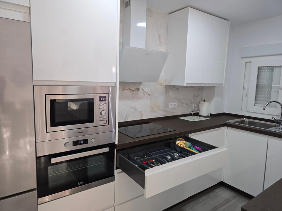 Kitchen or kitchenette, oven, stove