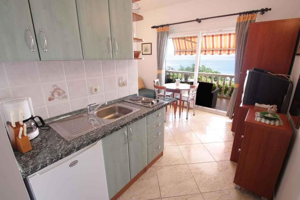 Coffee/tea facilities, Balcony/Terrace, Kitchen or kitchenette, Living room, Dining area