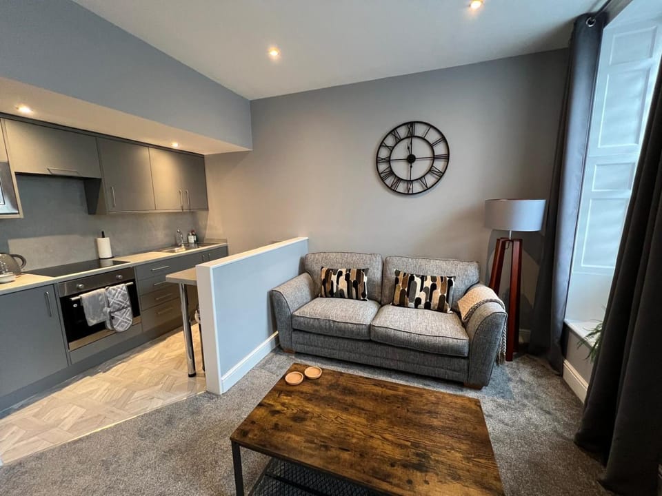 Kitchen or kitchenette, Living room, Seating area, stove