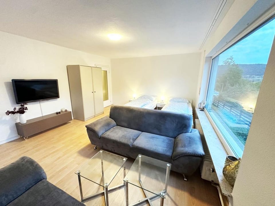 Bed, TV and multimedia, Seating area, Evening entertainment, Bedroom, wardrobe