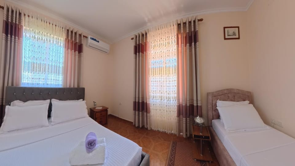 Bed, Photo of the whole room, Bedroom, towels, air conditioner