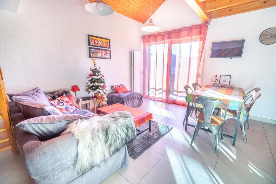 Duplex dans chalet avec superbe vue lac et piscine commune Apartment in Gérardmer