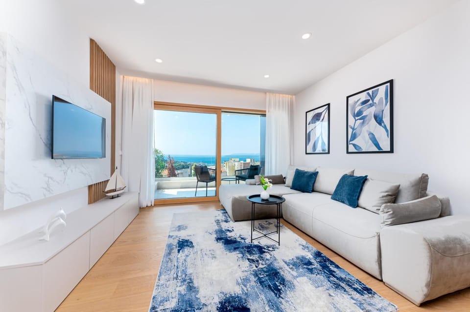 TV and multimedia, View (from property/room), Living room, Seating area, Lake view, Sea view