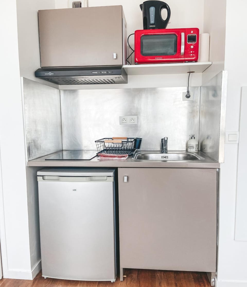 Kitchen or kitchenette, stove