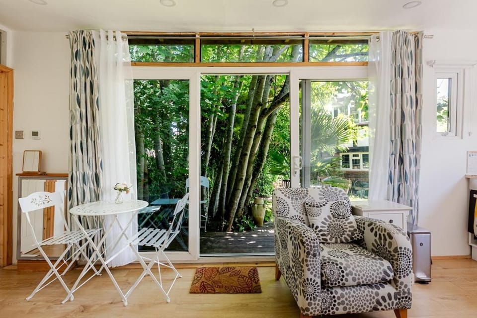 Patio, Day, View (from property/room), Seating area, Dining area, Garden view