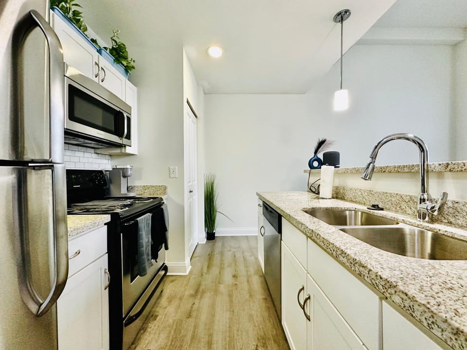 Two Bedroom Game Day Suite with 100 Projector TV Apartment in Indianapolis