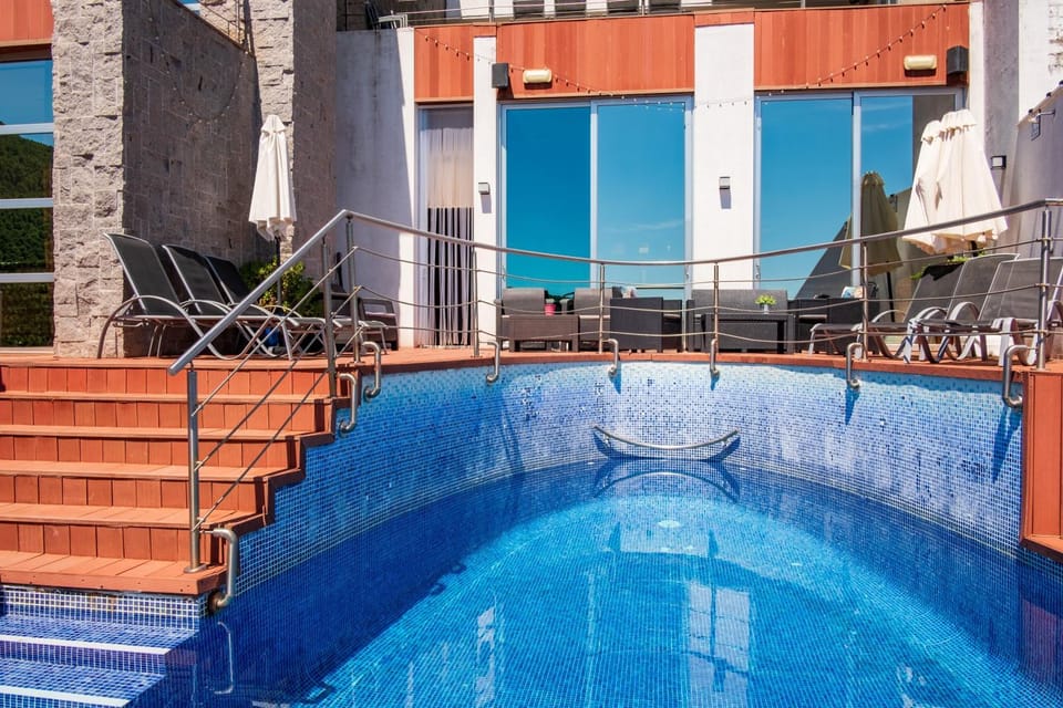 Property building, Living room, Swimming pool