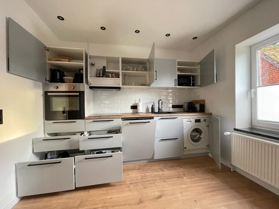 Kitchen or kitchenette, stove, kitchen