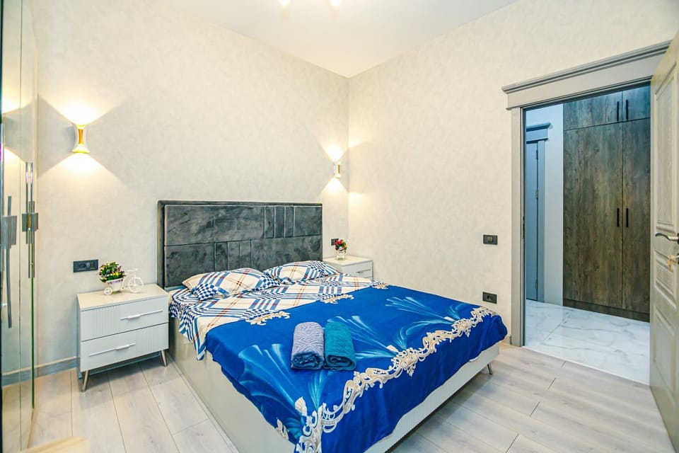 Bed, Photo of the whole room, Bedroom, towels, wardrobe