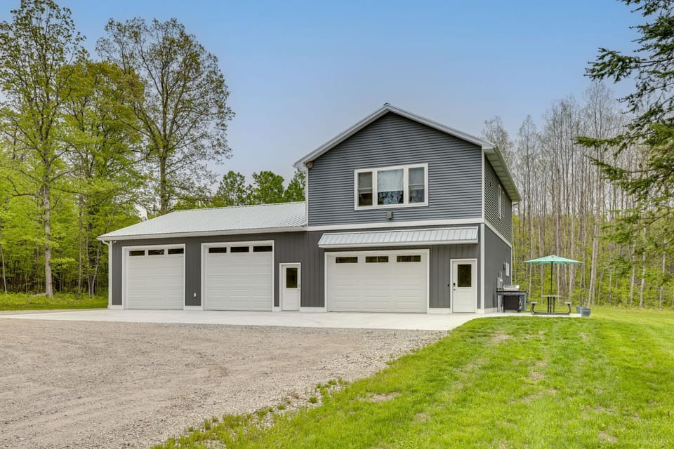 0.5 MI to Higgins Lake: Home w/ Fire Pit & Yard House in Michigan