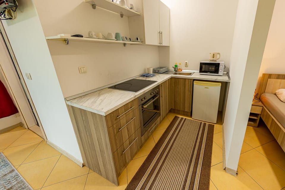 Kitchen or kitchenette, oven, stove