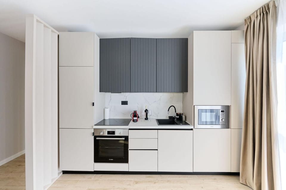 Kitchen or kitchenette, oven, stove
