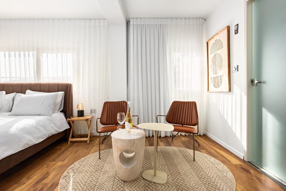 Bed, Living room, Seating area, Bedroom
