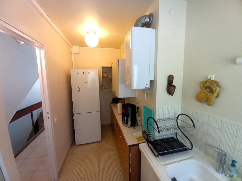 Kitchen or kitchenette, oven, stove, toaster