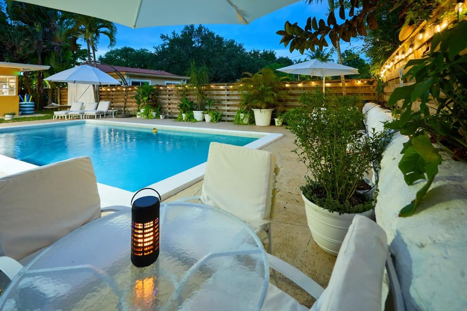 Property building, Patio, Seating area, Pool view, Swimming pool, sunbed