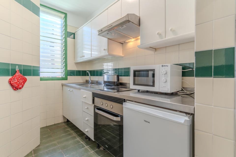 Kitchen or kitchenette, oven, stove, toaster