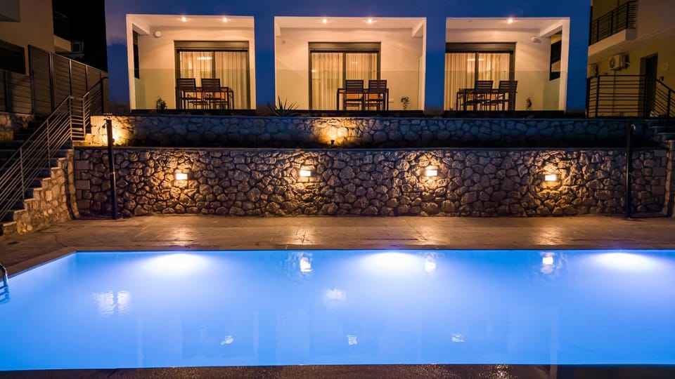 Patio, Night, Pool view, Swimming pool, sunbed