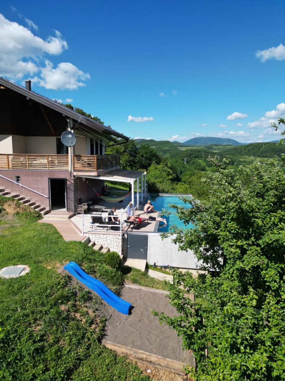Property building, Day, Natural landscape, Garden, Pool view, Swimming pool, sunbed
