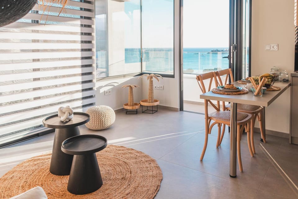 Natural landscape, Living room, Seating area, Dining area, Sea view