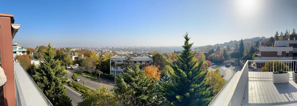Property building, Day, Neighbourhood, Natural landscape, City view