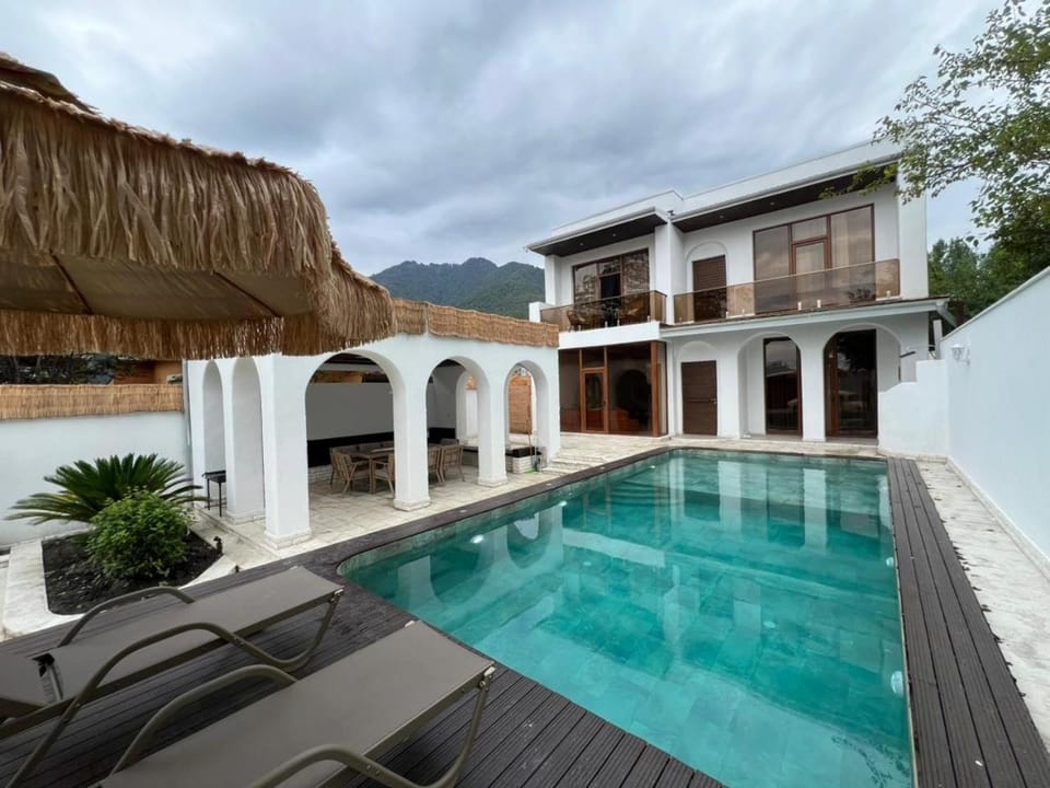 Property building, Patio, Day, Natural landscape, Mountain view, Pool view, Swimming pool, sunbed