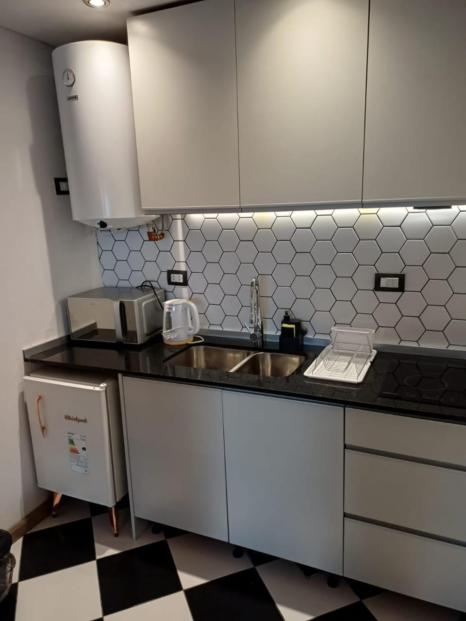 Kitchen or kitchenette, stove