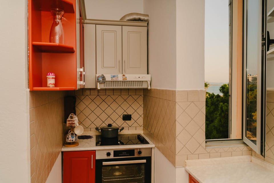 Kitchen or kitchenette, stove