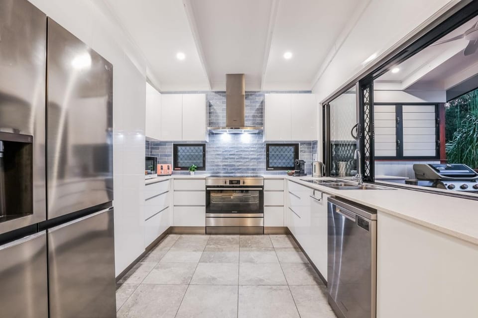 Kitchen or kitchenette, dishwasher, oven, stove, toaster