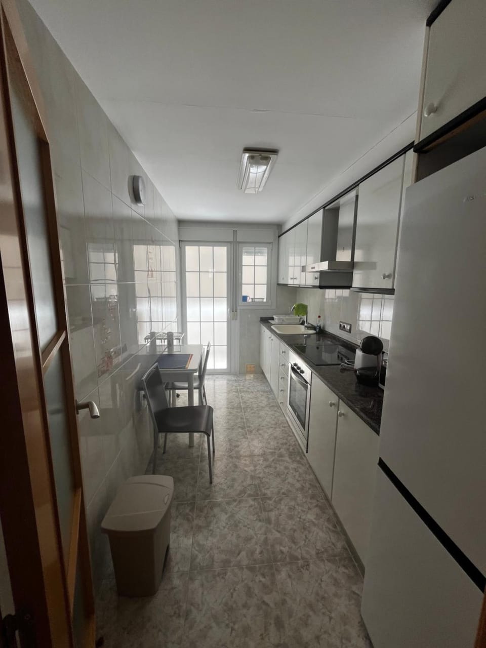 Kitchen or kitchenette, oven, stove