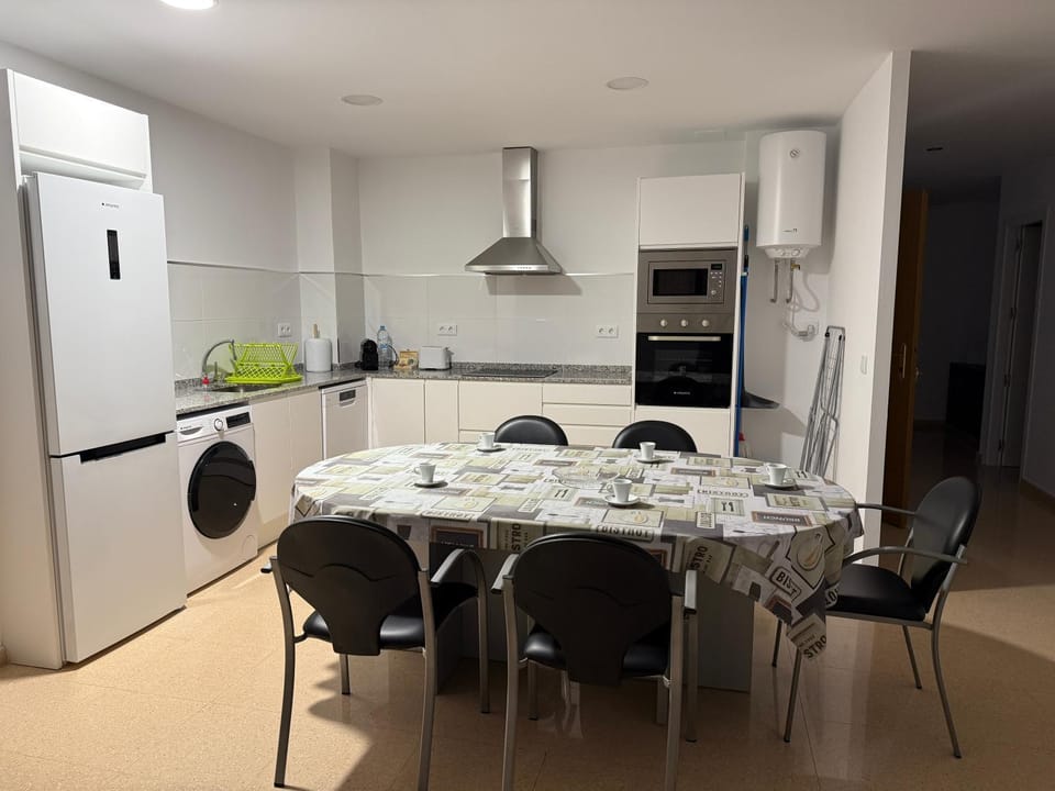 Kitchen or kitchenette, dishwasher, oven, stove, toaster