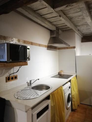 Kitchen or kitchenette, dishwasher, stove, washing machine, kitchen