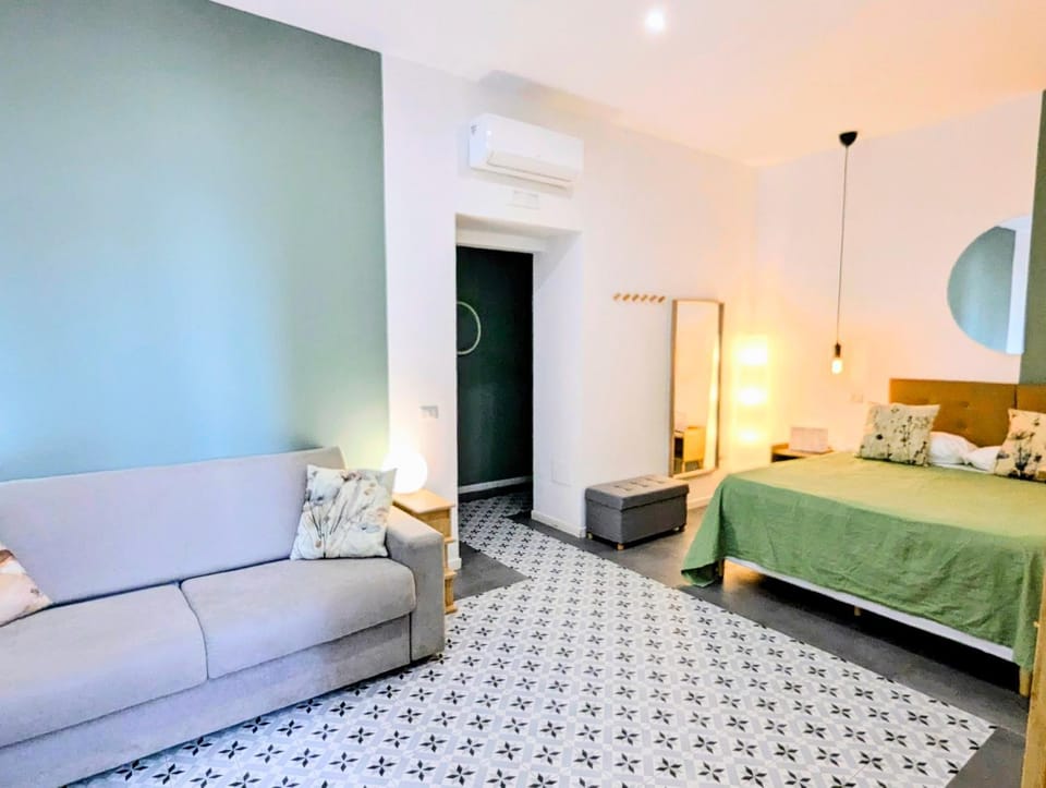 Bed, Living room, Photo of the whole room, Seating area, Bedroom, wardrobe, air conditioner