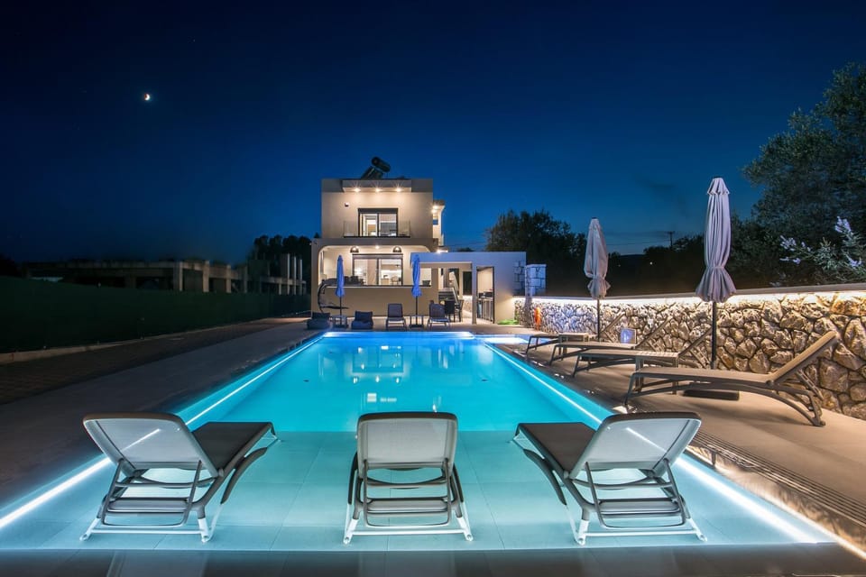 Property building, Night, Swimming pool, sunbed