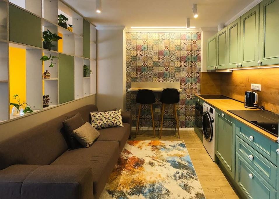 Kitchen or kitchenette, Living room, Seating area, dishwasher, stove