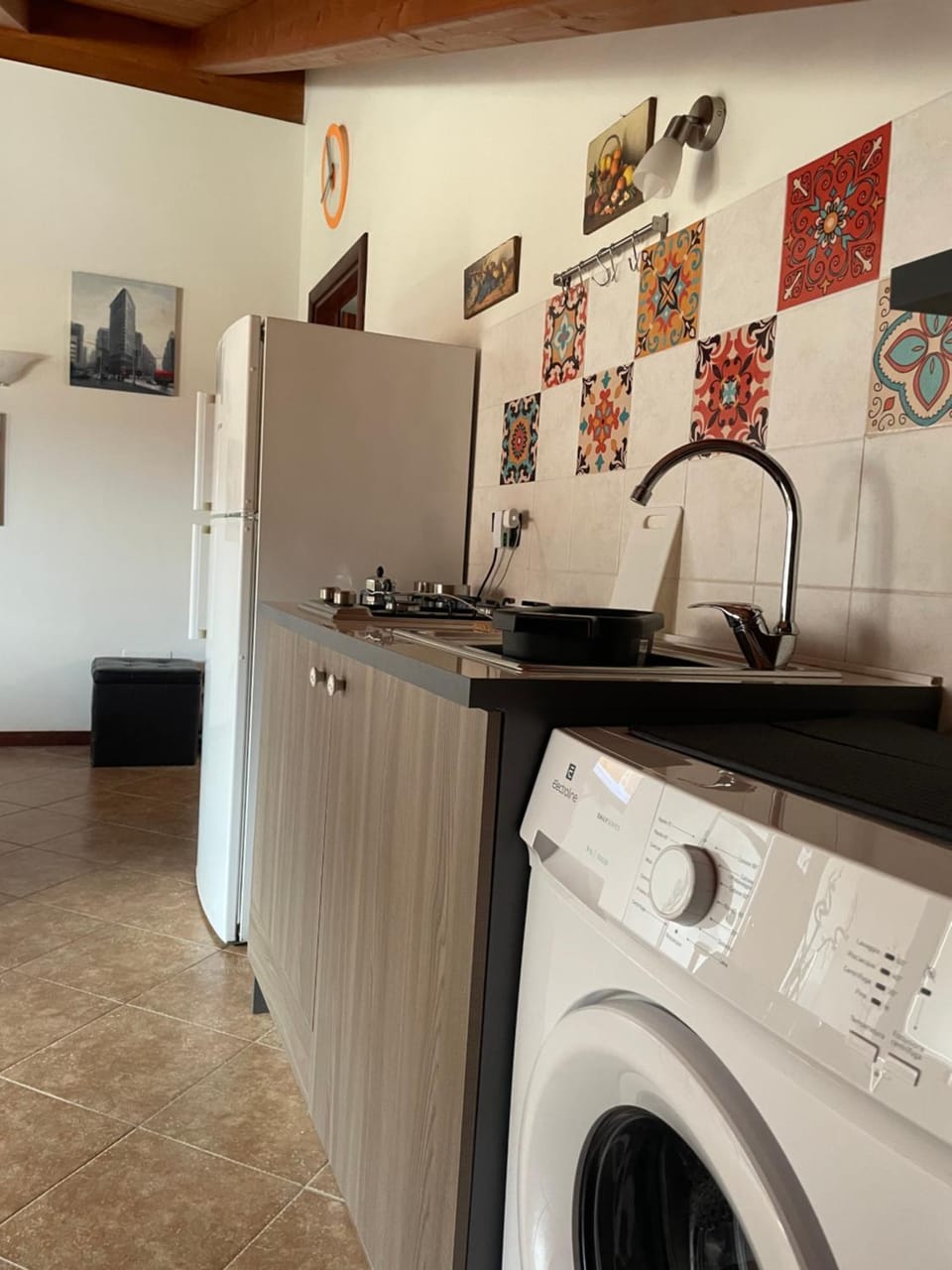Kitchen or kitchenette, stove, washing machine
