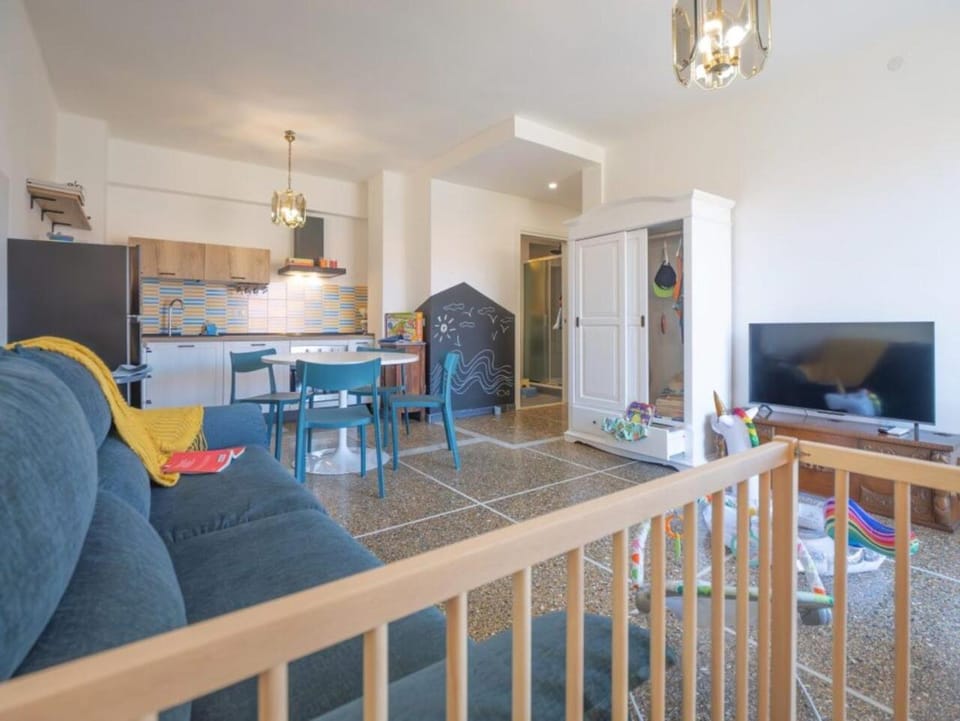 Dining area, cot, wardrobe