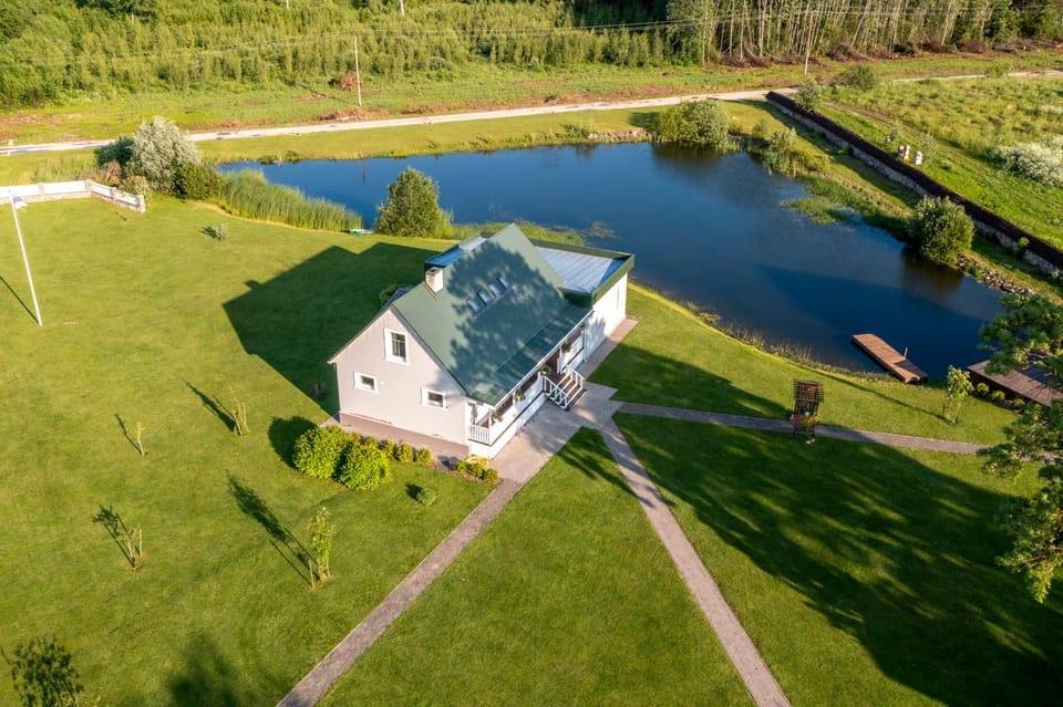 Luxury Waterfront Retreat with Panorama Room & Sauna at Sinso Talu House in Estonia