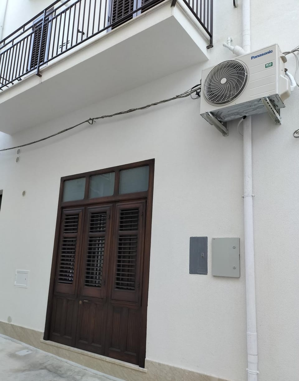 Property building, air conditioner
