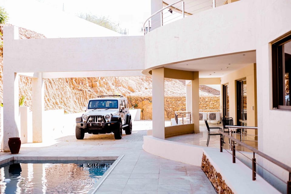 Property building, Seating area, Pool view, Parking