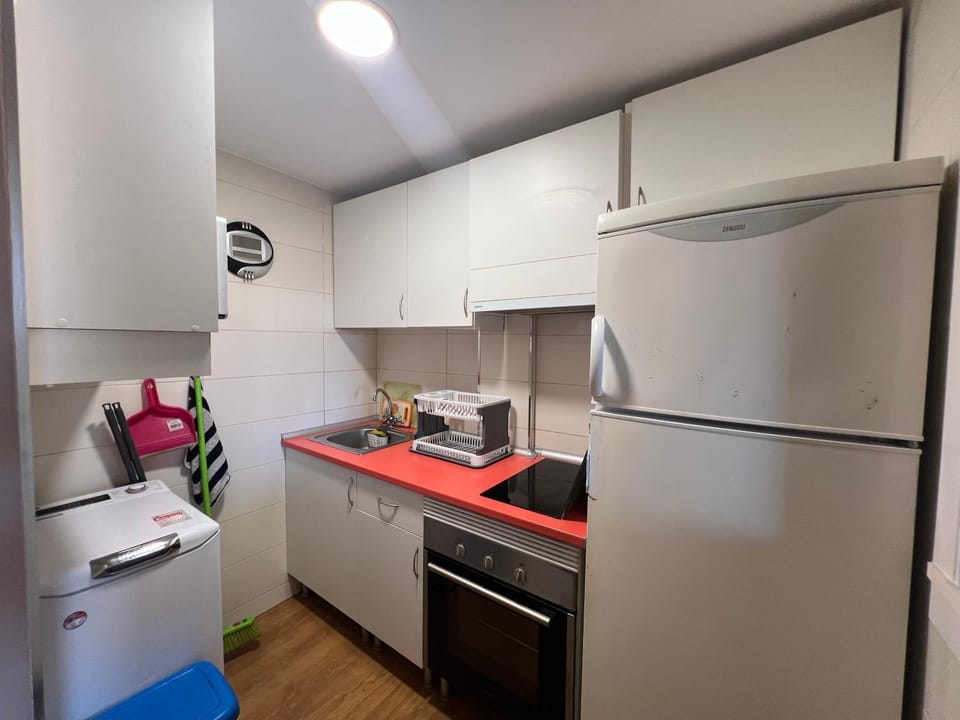 Kitchen or kitchenette, oven, stove, toaster